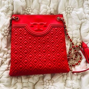 Authentic Tory Burch leather quilted swingpack.